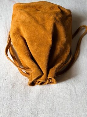Suede Drawstring Shoulder Bag in Mustard
